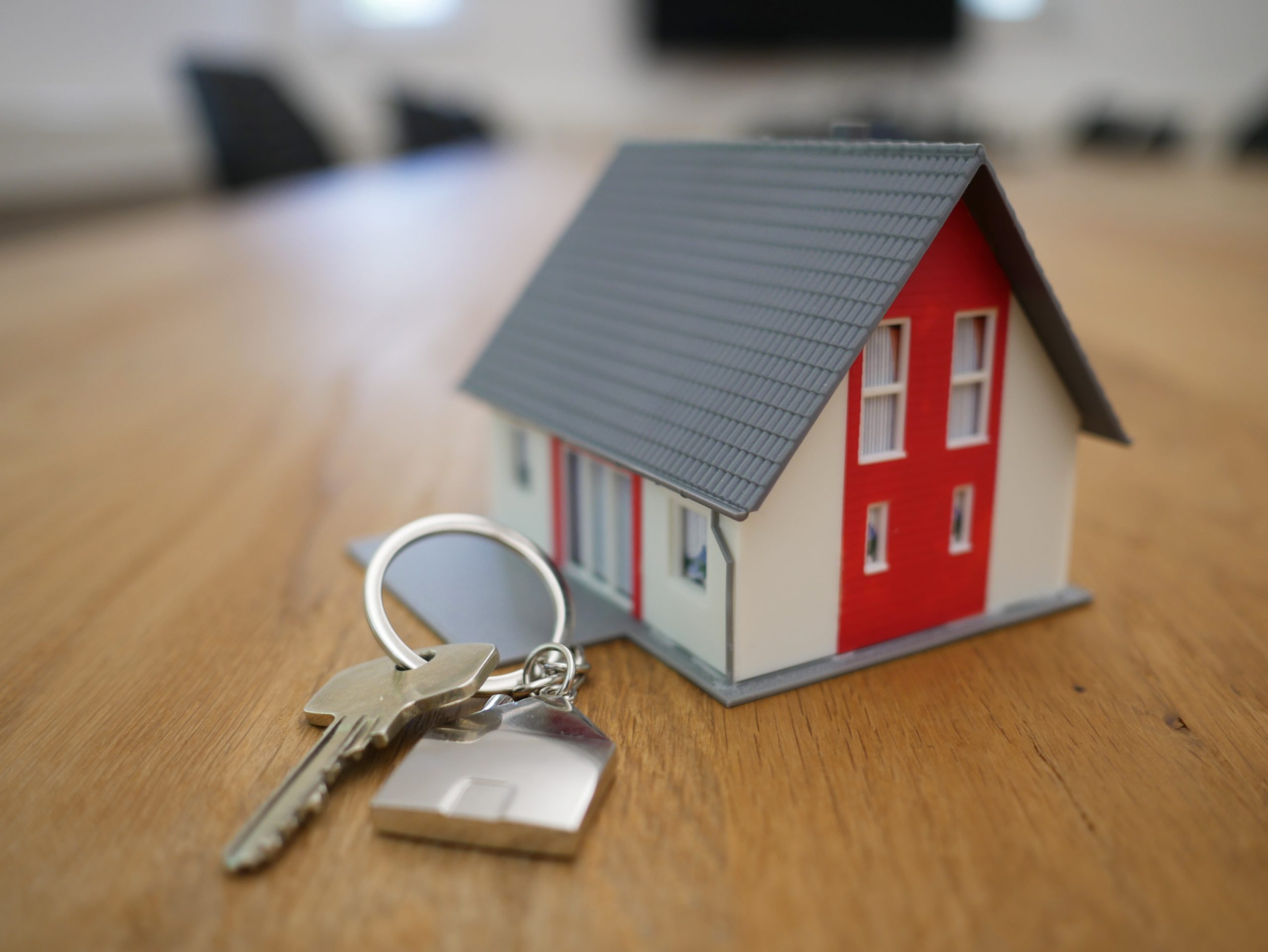 home with house key on table